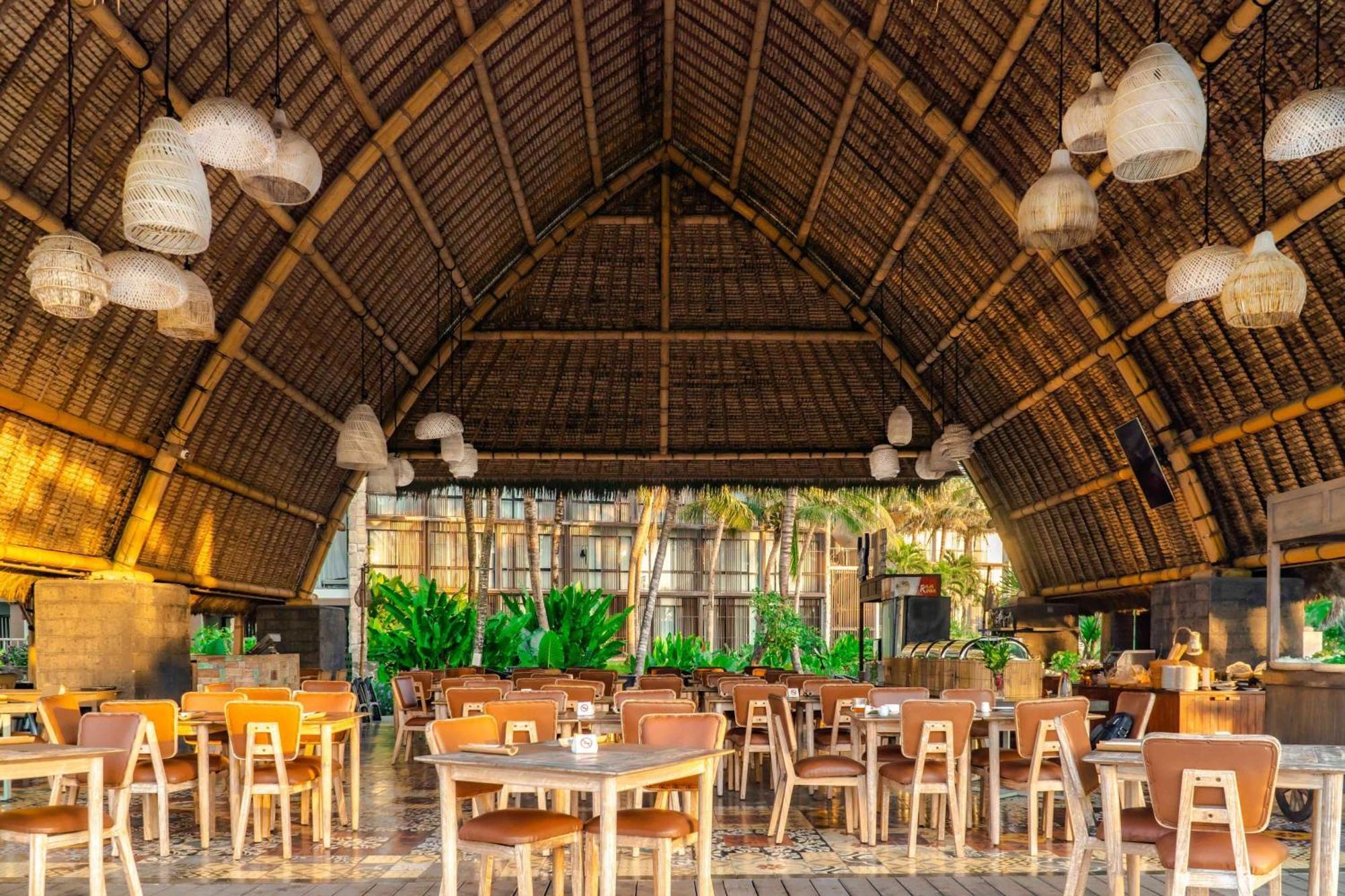 Wyndham Tamansari Jivva Resort Bali Siyut Kültér fotó Interior of the restaurant