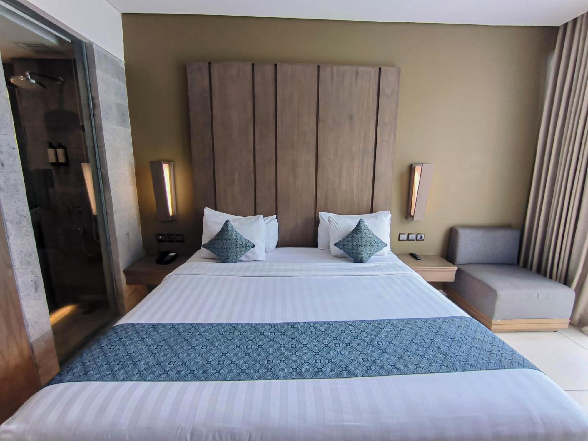 Wyndham Tamansari Jivva Resort Bali Siyut Kültér fotó A bedroom at the hotel
